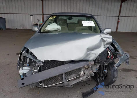 2003 Toyota Corolla Le z USA, uszkodzony, nr VIN JTDBR32E030036896